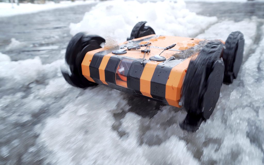 The Outdoor-UGV, a 3D-printed unmanned ground vehicle, on snow during a field test